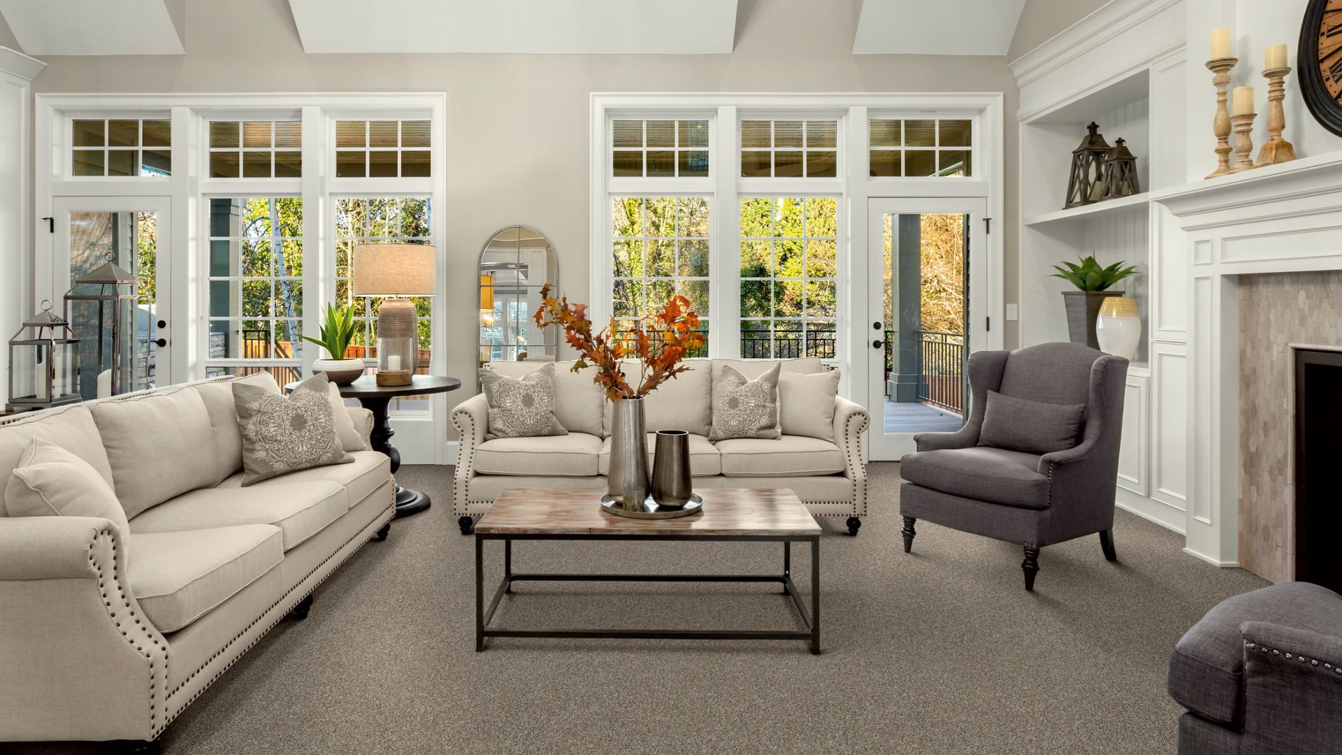 Gray carpet in a large living room.